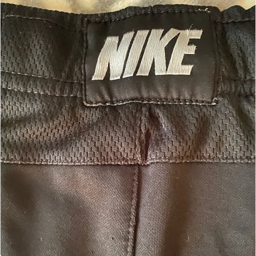 Nike Black Athletic Shorts polyester white strip on sides, side pockets  C